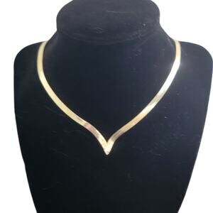 Gold tone v shaped herringbone chain necklace